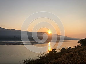 Beautiful orange sky sunrise in the morning background at Khong River Thailand