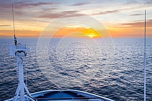 Beautiful Orange Sunset in the Ocean captured from a ferry deck between Denmark, and Faroe Islands