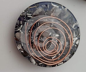 Beautiful orgonite pieces in circular shape with copper spiral