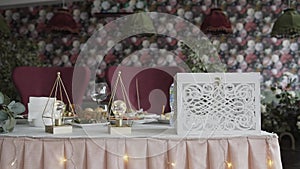 Beautiful and original decor in the wedding table in the restaurant. wedding details on the table
