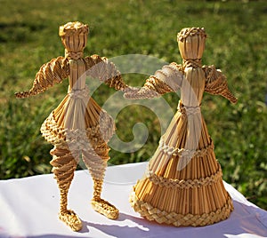 Beautiful original straw doll is made on motives of folk traditions