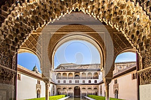 Ornate arches of the courtyard of Alhambra, Granada, Spain photo