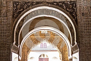 Ornate arches of Camares Patio in Alhambra, Granada, Spain photo