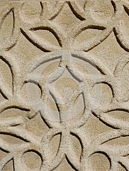 Beautiful ornate in Sgraffito (Esgrafiado) technique on the old wall in Segovia, Spain