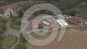 A beautiful Orthodox monastery and a village yard in the mountains from a height