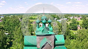 Beautiful Orthodox wooden church of the Assumption of the Blessed Virgin Mary in the city of Cherepovets in the Vologda