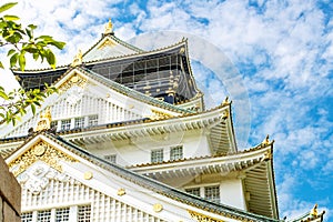 Beautiful Osaka castle in Japan on sunny summer day. Famous castle, attraction for tourists and sightseeing. Japanese
