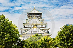 Beautiful Osaka castle in Japan on sunny summer day. Famous castle, attraction for tourists and sightseeing. Japanese