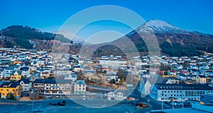 Beautiful outdoor view of colorful buildings from the mountain Aksla at the city of Hurtigruten with two huge mountains