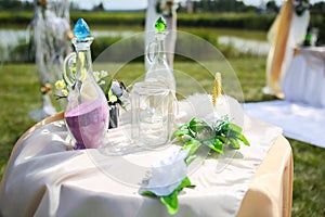 Beautiful outdoors wedding ceremony details. Decoration on patry.