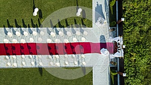 Beautiful outgoing wedding ceremony with red carpet top view