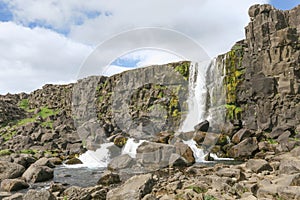 .Beautiful Oxararfoss waterfall in summer, Thingvellir National Park