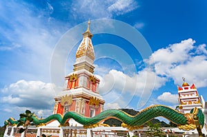 Beautiful pagoda of Thepnimit temple on high peak of Patong