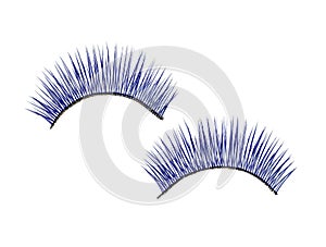 Beautiful pair of blue false eyelashes on  background, top view