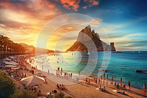 Beautiful panorama of Calpe beach at sunset, Alicante, Spain, Picturesque view of Cala d'Hort tropical Beach, people