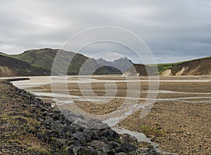 Beautiful panorama of colorful volcanic mountains in Landmannalaugar camp site area of Fjallabak Nature Reserve in