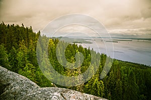 A beautiful panorama of lake and forest from Koli National park peaks