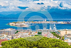 Beautiful panorama of Messina port with blue mountains in the background