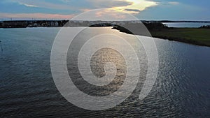 Beautiful panorama nature landscape over ocean colorful at sunset with clouds reflection on of vivid sunset sky