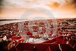 Beautiful panorama of old town and Baixa district in Lisbon city during sunset, seen from Sao Jorge Castle hill