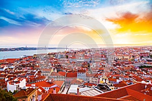 Beautiful panorama of old town and Baixa district in Lisbon city during sunset, seen from Sao Jorge Castle hill
