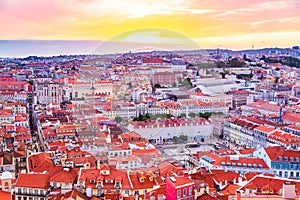 Beautiful panorama of old town and Baixa district in Lisbon city during sunset, seen from Sao Jorge Castle hill