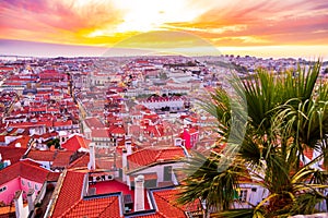 Beautiful panorama of old town and Baixa district in Lisbon city during sunset, seen from Sao Jorge Castle hill