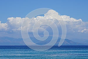 Beautiful panorama of the sea of Corfu with the mountains of Igoumenitsa in the background photo