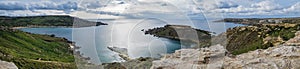 Beautiful panorama view of the Gnejna bay beach in Malta photo