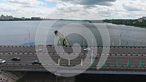 Beautiful panorama of wide river dividing city on two parts on summer day