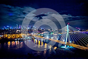 Beautiful panoramic aerial drone skyline view of the center of night Warsaw with skyscrapers in the background with the