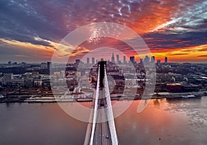 Beautiful panoramic aerial drone sunset view to Warsaw city center with skyscrapers and Swietokrzyski Bridge En: Holy Cross