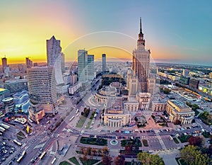 Beautiful panoramic aerial drone view at sunset to the center of Warsaw City and Palace of Culture and Science - a notable high-