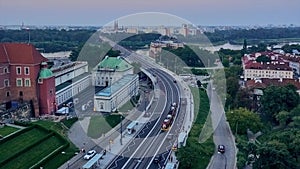 Beautiful panoramic aerial drone view to cable-stayed Siekierkowski Bridge over the Vistula river and Warsaw City skyscrapers,