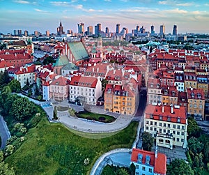 Beautiful panoramic aerial drone view on Warsaw Old town POL: Stare Miasto with modern skyscrapers on the horizon, Royal Castle