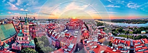 Beautiful panoramic aerial drone view on Warsaw Old town POL: Stare Miasto with modern skyscrapers on the horizon, Royal Castle