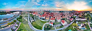 Beautiful panoramic aerial drone view on Warsaw Old town POL: Stare Miasto with modern skyscrapers on the horizon, Royal Castle