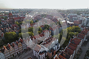 Beautiful panoramic architecture of old town in Gdansk, Poland at sunrise. Aerial view drone pov. Landscape cityscape