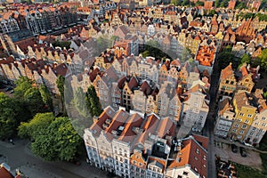 Beautiful panoramic architecture of old town in Gdansk, Poland at sunrise. Aerial view drone pov. Landscape cityscape