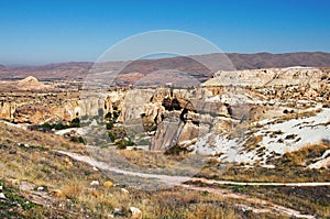 Beautiful panoramic landscape photo of typical geologic formations of Cappadocia. Amazing shaped sandstone rocks.