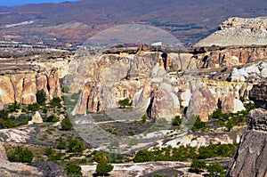 Beautiful panoramic landscape photo of typical geologic formations of Cappadocia. Amazing shaped sandstone rocks