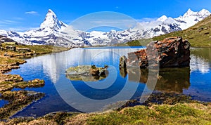 Beautiful panoramic summer view of the Stellisee lake with reflection of the iconic Matterhorn Monte Cervino, Mont Cervin