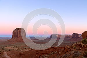 Beautiful panoramic sunset view over famous Buttes of Monument Valley on the border between Arizona and Utah