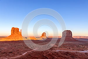 Beautiful panoramic sunset view over famous Buttes of Monument Valley on the border between Arizona and Utah