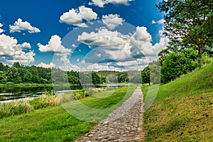 Beautiful Panoramic View With Amazing Clouds. Amazing River and Forest Landscape, Stepping Stone. Lithuania