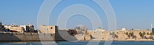 Beautiful panoramic view of the ancient walls of the old city of Acre in Israel.