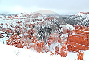 Beautiful panoramic view of Bryce canyon Nationalpark with snow in Winter with red rocks / Utah / USA