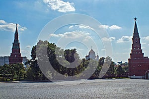 Panoramic view of Cathedral of Christ the Savior between two Kremlin towers Moscow photo