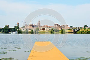 Beautiful panoramic view of the historic city of Mantua from the quay on the river Mincio, Mantua, Lombardy, Italy
