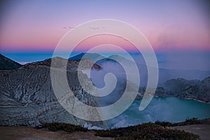 beautiful panoramic view of ijen crater at sunrise.